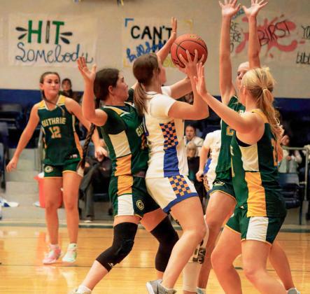 DISTRICT LEADER The 25-3 Guthrie Lady Jaguars, ranked #14 in the state in theTexas Association of Basketball Coaches poll, picked up a pair of wins last week.They defeated the Spur Spurettes 43-35 and theValley Lady Patriots 46-28.They are undefeated in District play, 4-0, and lead District 8-1A.They are scheduled to face Motley County Jan. 30. | COURTESY PHOTO
