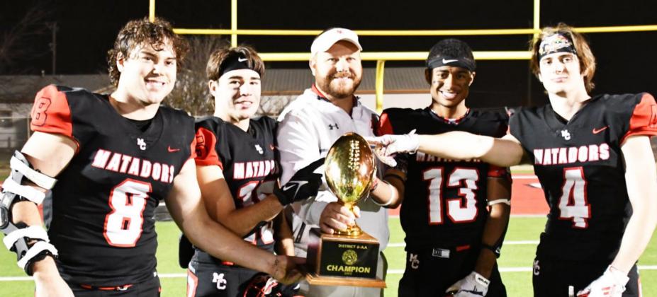 CAPTAINS &amp;amp; COACH Motley County’s head coach Mike Bigham celebrates a playoff victory with the team captains—all seniors, from left, #8 Jace Martin, #15 Kason Degan, #13 Demetric Sims and #4 Jake Richards. | COURTESY PHOTO
