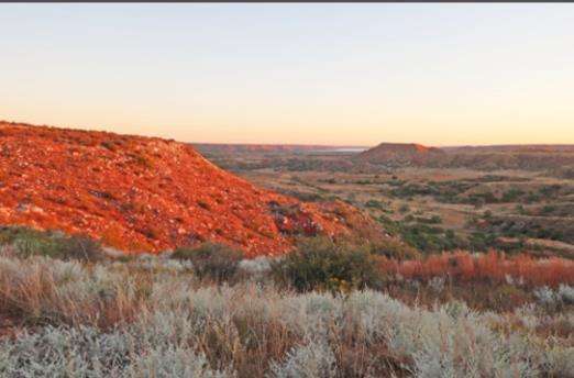 EARLY MORNING, EARLY PEOPLES The Alibates Flint Quarries National Monument is open only to rangerguided hikes that begin early in the day—but among the rewards are stunning views of the Canadian River Valley. | CAROL CAMPBELL PHOTO