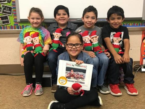 Students pictured:  Back L to R — Pyper Wiley, Jordin Rodriguez, Quintin Ramos, Jordan Pina. Holding book — Macee Garcia. Students not pictured are Paityn Bell, Aiden Garibaldi, and Anyeya Pleasant.