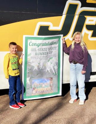 HOMETOWN CELEBRATION The Guthrie Jaguars cheerleaders were welcomed back from their state cheer competition with a salute from classmates and townsfolk. The cheerleaders were the State championship runners-up. | COURTESY PHOTOS