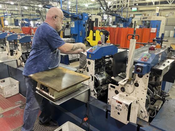 ALL THE PRINT THAT’S FIT FOR NEWS is now at your service from platemaking to printing to folding to inserting ad circulars (the process shown here) to addressing, avoiding the need for numerous offline operations previously done by hand at our office. | CAPROCK COURIER