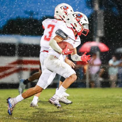 Owls pull off rainy victory over Roughriders