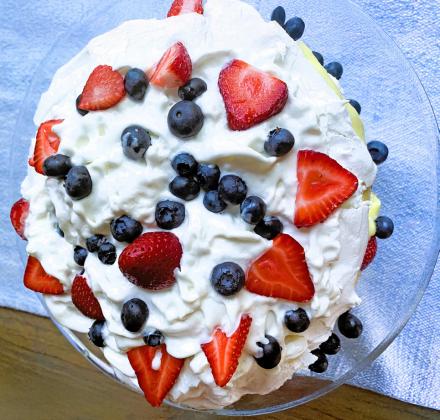 THE PAVLOVA CAKE has been revived and made more popular in recent years; this one includes fresh blueberries and sliced strawberries for a nice summery touch. | ANGELINA LaRUE PHOTO