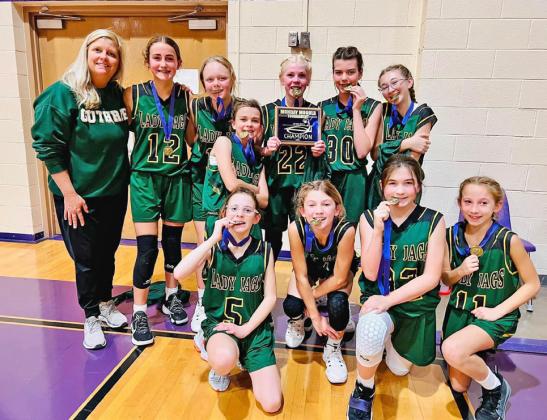 TOURNEY CHAMPS The Guthrie Junior High girls basketball team won the Munday tournament last week. | COURTESY PHOTO