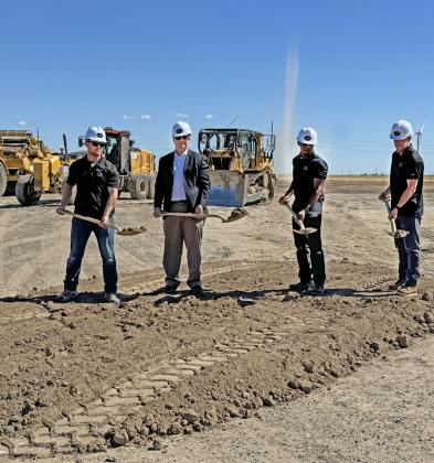 EARTH AND SKY Representatives of Soluna Computing, including CEO John Belizaire (second from right), turned over ceremonial shovels of dirt at a groundbreaking ceremony last Wednesday for phase 2 of the firm’s data center in Briscoe County. As the cameras clicked, a gust of wind behind the men churned into a small landspout, which quickly dissipated. We’ll have more on what Soluna’s data processing means for Briscoe County in next week’s issue. | CAPROCK COURIER