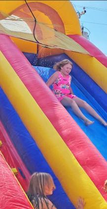 LIBRARY FUN The Motley County Library has offered a variety of summer programs for youngsters this month. This week, they provided a water slide for the kids to enjoy. | COURTESY PHOTOS