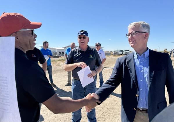ON HAND FOR PROJECT DOROTHY 2 GROUNDBREAKING were Albert Daniel and Mike Green from Lighthouse Electric Cooperative, and (at right, shaking hands with Soluna CEO John Belizaire) John Eichelmann, vice president, Member Services and Power Delivery, of Golden Spread Electric Cooperative.