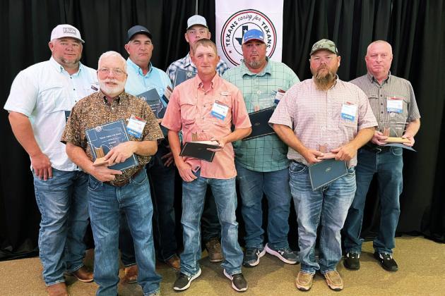 MOTLEY HONORS Motley County Highway Department maintenancecrew, including Scott Fulton, Crawford Mason, GarySimpson, Terry Simpson, Jerry Jones, Matthew Woolsey, Reagan Elliott, Hall Martin, David Stafford, Sammy Hutchison and John Jones, were honored at the annual Texans Caring for Texans ceremony on the campus ofWestTexas A&amp;amp;M University in Canyon last week. They were specifically recognized for their work during last year’s tornado. | TXDOT PHOTO