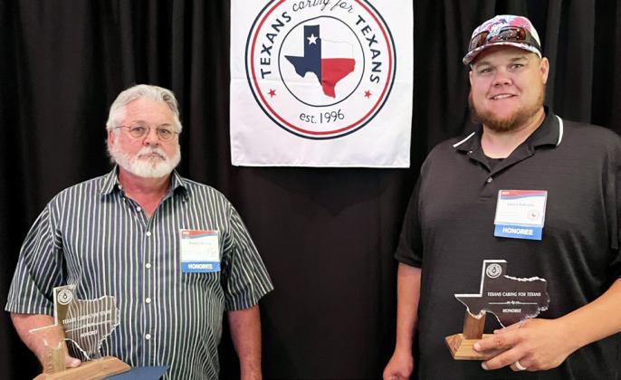 HONORSAWARDED Cottle/King County maintenance employees Randy Worley and Lance Rekieta received the annual award for their quick thinking in what was later discovered as a dire situation for two children. | TXDOT PHOTO