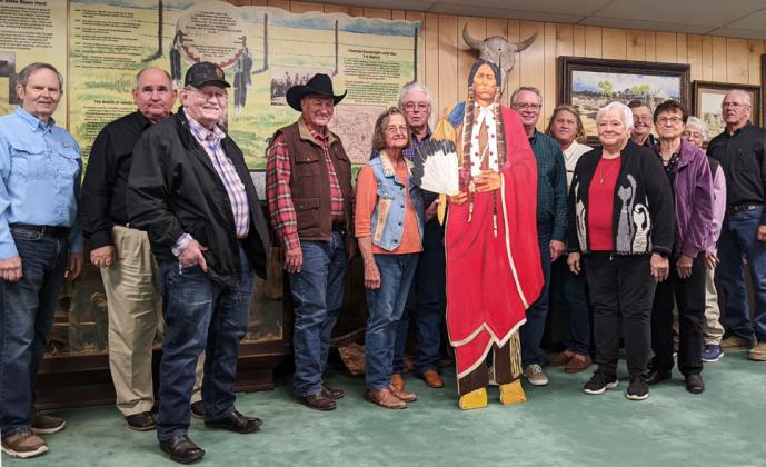 TRAIL SEEKERS at Comanchero Canyons Museum recently were museum president Jerry Leatherman, Bell Helwig, Jim Crownover, Duane Johnson, Marisue Potts and Rusty Etheredge, Standing Quanah of the Quanah Parker Trail project, Neal Odom, Rhonda Gallagher, Ada Lester, David Seitz, Melba Seitz, Dee Seitz, and Chris McClure. | PHOTO BY TAI KREIDLER