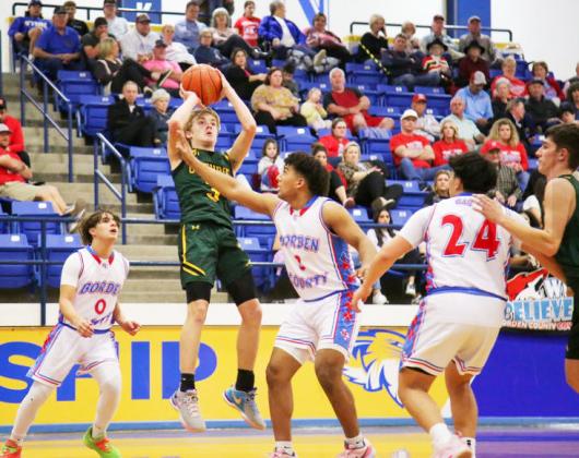 JAGS FALL The Guthrie Jaguars boys varsity basketball team fell to the Borden County Coyotes 49-33 in last week’s bi-district playoff game. | COURTESY PHOTO