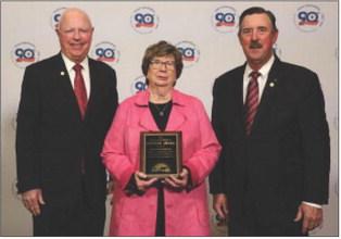 FARM BUREAU HONORS Dianne Washington (center) accepted the Texas Farm Bureau (TFB) District 2 Pioneer Award on Dec. 2 on behalf of the late Seab Washington of Motley County. The award was presented by TFB President Russell Boening (right) and TFB Secretary-Treasurer / District 2 State Director Walt Hagood. | COURTESY PHOTO