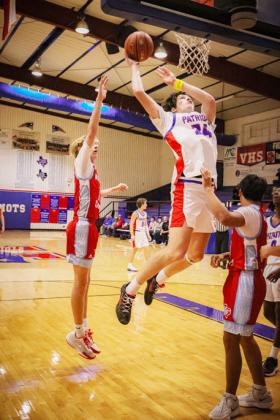 TAYLOR BROTHER DOING TAYLOR THINGS Sophomore Corbin Taylor proved a formidable match for the Borden County Coyotes in the paint, scoring 27 points at home Dec. 4. | DEY LANE