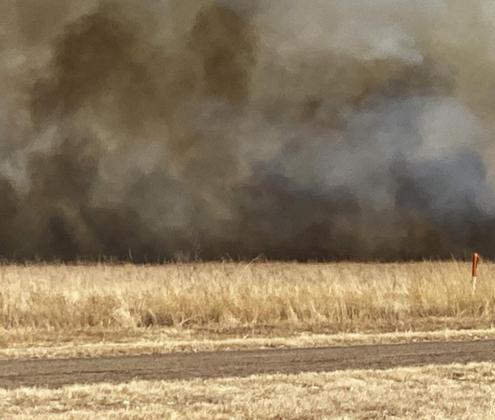 A FAST-MOVING GRASS FIRE burned more than 400 acres of dry land between Lockney and Floydada Sunday afternoon, with DPS closing U.S. Highway 70 to traffic for a while. | FRED CERVANTES PHOTOS