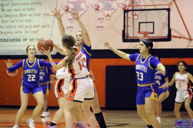 PADUCAH BASKETBALL Last week Paducah split a pair of games with Spur.The Dragons defeated the Bulldogs 58-33, and the Lady Dragons fell to the Spurettes 88-6. | COURTESY PHOTOS