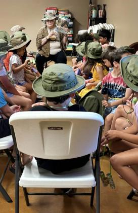Silverton Library’s“Jump Into the Jungle”came to an end last week in true safari style.Volunteer Dave Norris read poems of different animals and guided youngsters in making necklaces as a souvenir of their travels. | COURTESY PHOTOS