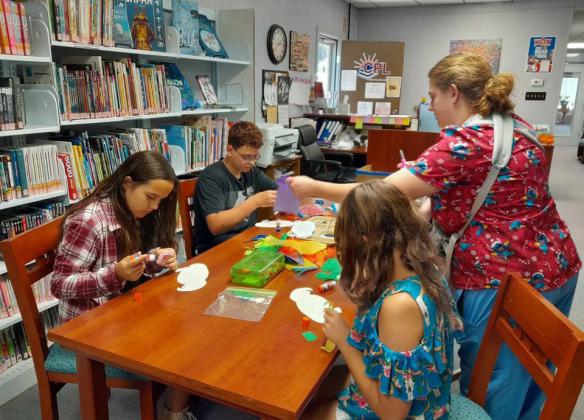 CAPROCK SUMMER READING Caprock Public Library in Quitaque had a great start to their 2025 Summer reading program. They read the book Papagayo: The mischief maker, and the kids made their own unique parrot. Each kid was given their goodie bags and checked out some new books to read for the summer! Next week the library will have Stephanie Otis coming to do food art. The summer reading program is Wednesdays from 2to4p.m.|COURTESYPHOTOS