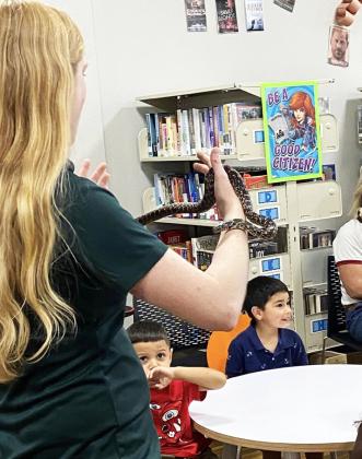 PADUCAH LIBRARY Caroline Ellison, assistant area manager/wildlife biologist of Matador Wildlife Management, presented the first summer reading program last week at the Bi-Centennial Library in Paducah. A great group of children, pre-teens, teens, parents, care givers and volunteers enjoyed her informative program. | COURTESY PHOTOS