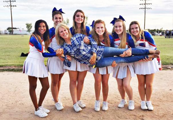 CHEERS!The legacy ofValley ISD’s longtime superintendent Jackie Jenkins is wrapped up in one pose—with the Patriots cheerleaders giving her a lift on the road to retirement. | COURTESY PHOTO