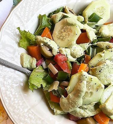 GREENGODDESSDRESSING originally consisted of mayonnaise, sour cream, lots of green herbs, and typically, lemon juice—but this freshened-up version features avocado or tahini. | ANGELINA LARUE PHOTO
