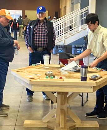 SHOWYOUR HAND Guthrie’s Zane Moore exhibited his custommade maple poker table at the San Angelo Ag Mechanics show in February. | GUTHRIE CSD PHOTOS