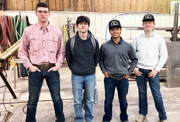 CRAFTY QUARTET Guthrie CSD participants in last month’s San Angelo Ag Mechanics show were (from left to right) JD Smith (red shirt), Zane Moore, Steven Uribe and Clay Hodges. | GUTHRIE CSD PHOTOS