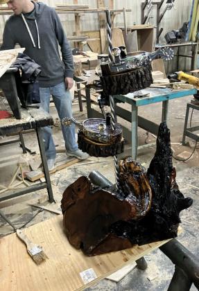 FOUR SIXES Working in the in the GuthrieCSDAgShop,JDSmithcreated custom spurs featuring a famous local brand as his entry in the San Angelo Ag Mech show.