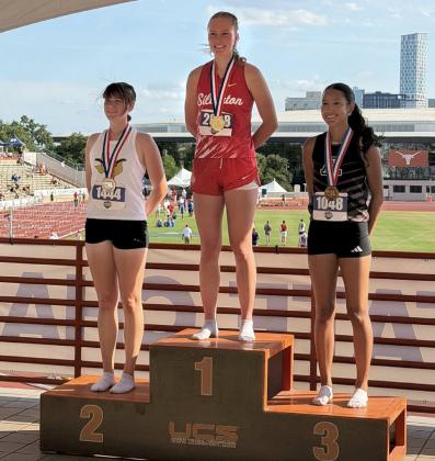 GOLD IN THE 100m In the girls 100m hurdles event, Maddie Francis, a senior from Silverton and the middle track-standout sister in her family, crossed the finish line as the State champion in the event with a new Conference 1A time of 14.53.