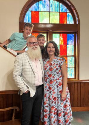 NEW PASTOR at First Baptist Church of Matador Leon Radford (front left, standing) has lived Matador for the past three years. The Caprock Courier looks forward to featuring Radford in a lengthier story soon, along with his wife, Matador native Tanya (right) and sons Eli and Liam (back row, from left). | COURTESY PHOTO