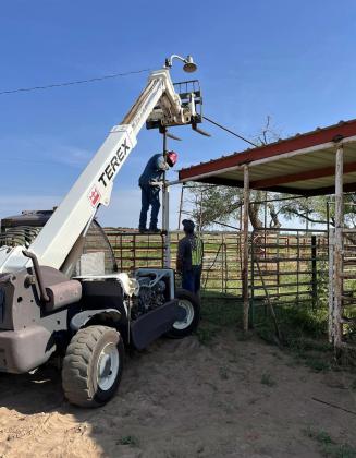ARENA UPDATED Organizers and volunteers of the Motley-DickensOldSettlersReunionandRodeoworkedtogetherlastweek to enhance the comfort of the Roaring Springs arena. The 101st annual event will take place August 22-24. | COURTESY PHOTOS
