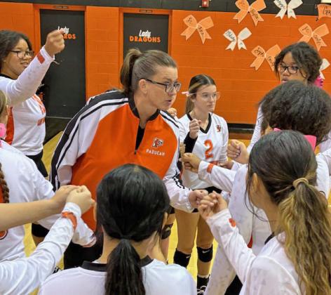 POSTGAME Paducah volleyball coach Alicia Nash post-game talk after the match with Benjamin. Nash’s team played a gritty three-set district contest with the league leading Lady Stangs. | SUE JANE SULLIVAN