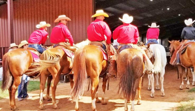 EQUINE ENTRANCE Cowboys prepare to promenade with horses for sale at a previous “Return to the Remuda” at the Four Sixes Ranch in Guthrie. | CAPROCK COURIER
