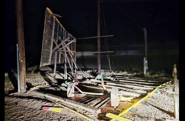 THERE IT WAS On July 21, a desert storm through the Joseph City area destroyed the original sign; Cindy and Tony posted this image on their Facebook page during the night. | COURTESY PHOTO
