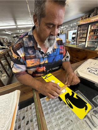 HEREHEIS The Jack Rabbit’s ownTony Jaquez crafted a miniature replica sign for us denoting 634 miles from our own headquarters in Spur, Texas, to here. | TEXAS SPUR