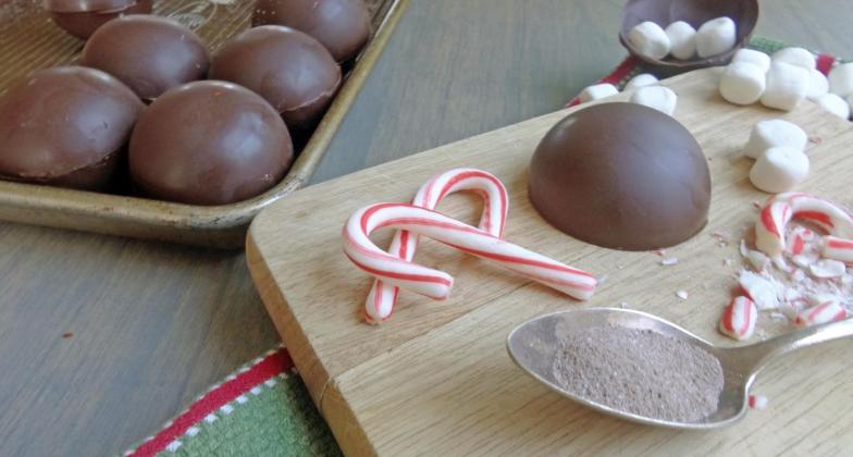 JUST DROP INTO WARM MILK and the cocoa bomb’s magic will happen quickly, depending on how hot the cup of milk is. | ANGELINA LARUE