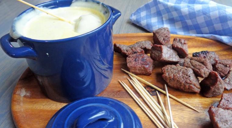 A TIP FOR BEEF TIPS Fondue’s just a fancy name for queso here in West Texas—and it goes great with beef tips on the grill. | ANGELINA LARUE