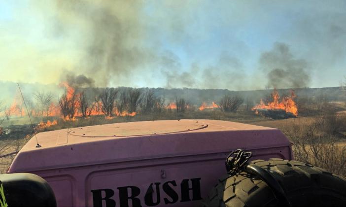 MOTLEY CO. FIRE A wildfire along Highway 70 in Motley County Sunday required firefighters from Matador,Turkey, Floydada, Quitaque and Flomot to battle the blaze, as well as air service and strike teams from the Texas Forest Service. It was contained by Sunday evening. | COURTESY PHOTOS