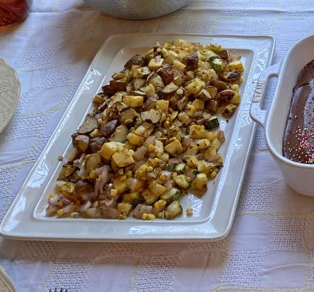 SUMMER SIDE DISH of squash, potato cubes and diced onion makes a perfect accompaniment for barbecue or Sunday dinner. | ANGELINA LaRUE PHOTO
