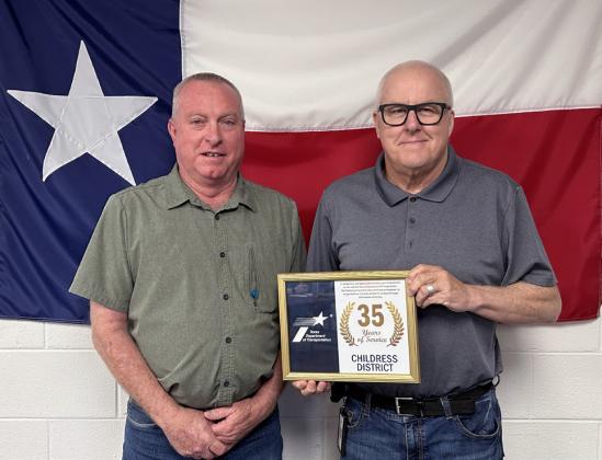 TERRY SIMPSON, Motley County maintenance, left, accepts his 35 years of service award from Childress District Engineer, Darwin Lankford. | TxDOT PHOTO