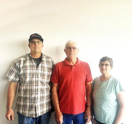 NEW OWNER JoDee Robison (left)—pictured with previous owners and bosses Anthony Kingery and Kathy Kingery—is the new owner of D and K Manufacturing of Silverton. The company, which began in 1976, manufactures irrigation equipment in addition to doing welding and machine work, and Robison has worked as an employee there for 30 years. | COURTESY PHOTO