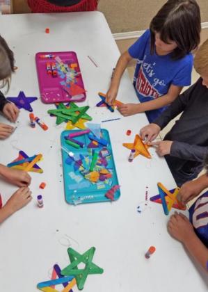 Caprock library takes youngsters on tour of ‘Christmas Around the World’