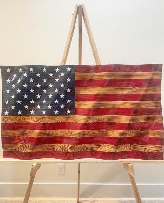 FLAG ART TO HIGHEST BIDDER Following the Memorial Day program in Roaring Springs May 26, there will be an auction of a beautiful, unique, handmade flag, with proceeds going to upkeep of the park. | COURTESY PHOTO