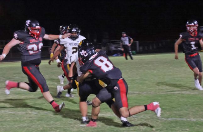 ORTIZ DOMINATES DEFENSIVELY Rolando Ortiz makes a defensive tackle after a kickoff to the Buffaloes in Friday night’s game, Oct. 3. | MOTLEY COUNTY MEMORIES