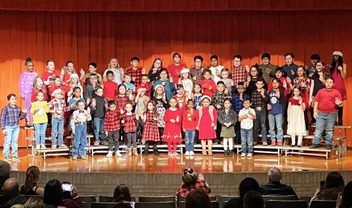 PADUCAH CHRISTMAS PROGRAM Christmas music provided holiday cheer last week at Paducah. The band and youngsters joined in a holiday program for the school and community. | COURTESY PHOTOS