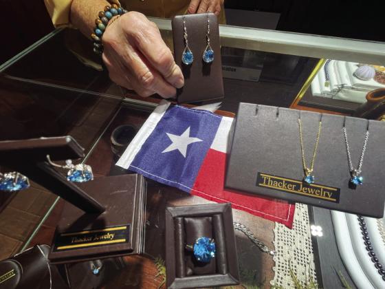 FINE JEWELRY is Thacker’s hallmark, with elegant pieces such as these Texas blue topaz earrings and rings featuring a star cut. | CAPROCK COURIER