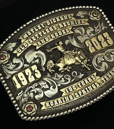 FRIENDSHIP Thacker Jewelry supports worthy causes in Motley County and elsewhere with generous donations—such as this year’s one-of-a-kind benefit raffle prize, a gold-and-silver 100th Reunion and Rodeo buckle set with rubies. | CAPROCK COURIER