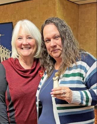 THE GAMMA ETA ANGEL was presented to Stephanie Martinez, 2021–23 incoming president of Gamma Eta (right), by Brenda Karr of Dickens.