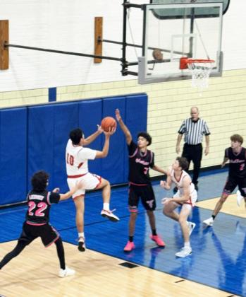 ALONSO BELTRAN takes a layup against the West Texas Tornadoes at the Whiteface Tournament on Saturday, Dec. 6. | COURTESY PHOTOS