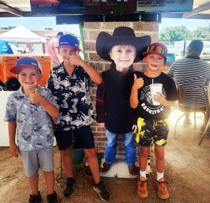 MATADOR GENEROSITY Volunteers donated the time and treasures in auctions, cornhole tournament, meals and music in a fundraiser July 13 for Paxton Barclay, who is being treated for a rare brain tumor. | COURTESY PHOTOS